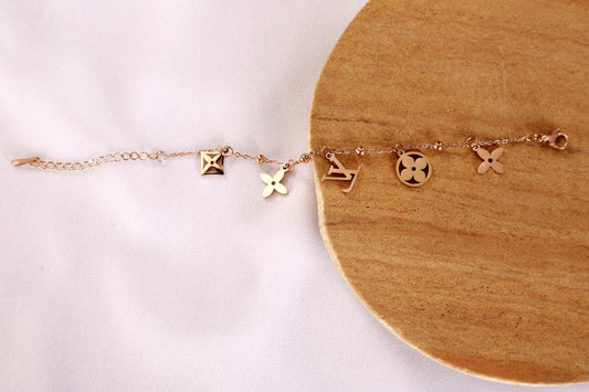 Rose Gold Designer-Inspired Charm Bracelet – Floral Motifs & Monogram Letter Accents